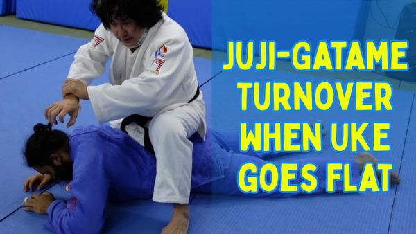 Juji-gatame against flat uke